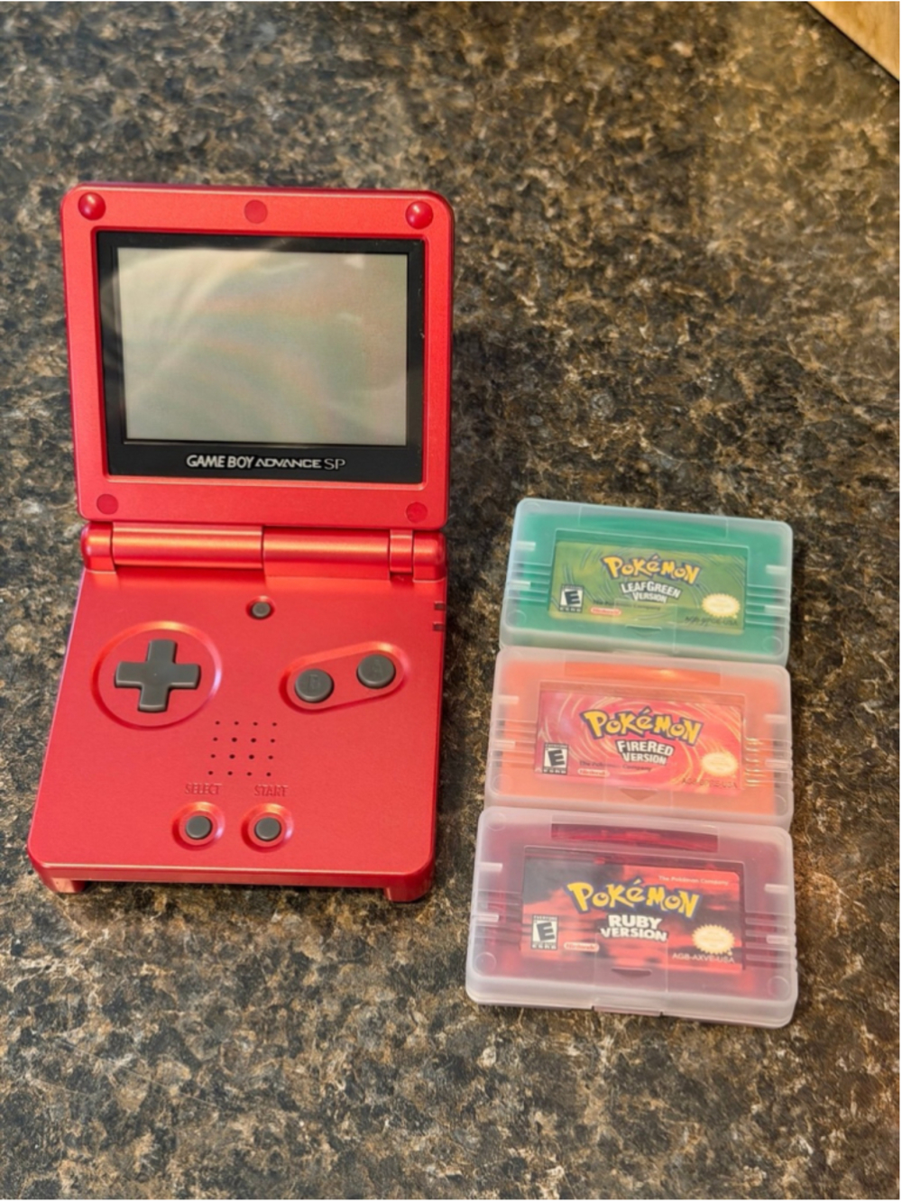 Nintendo Game Boy Advance SP & 3 Pokemon Games
